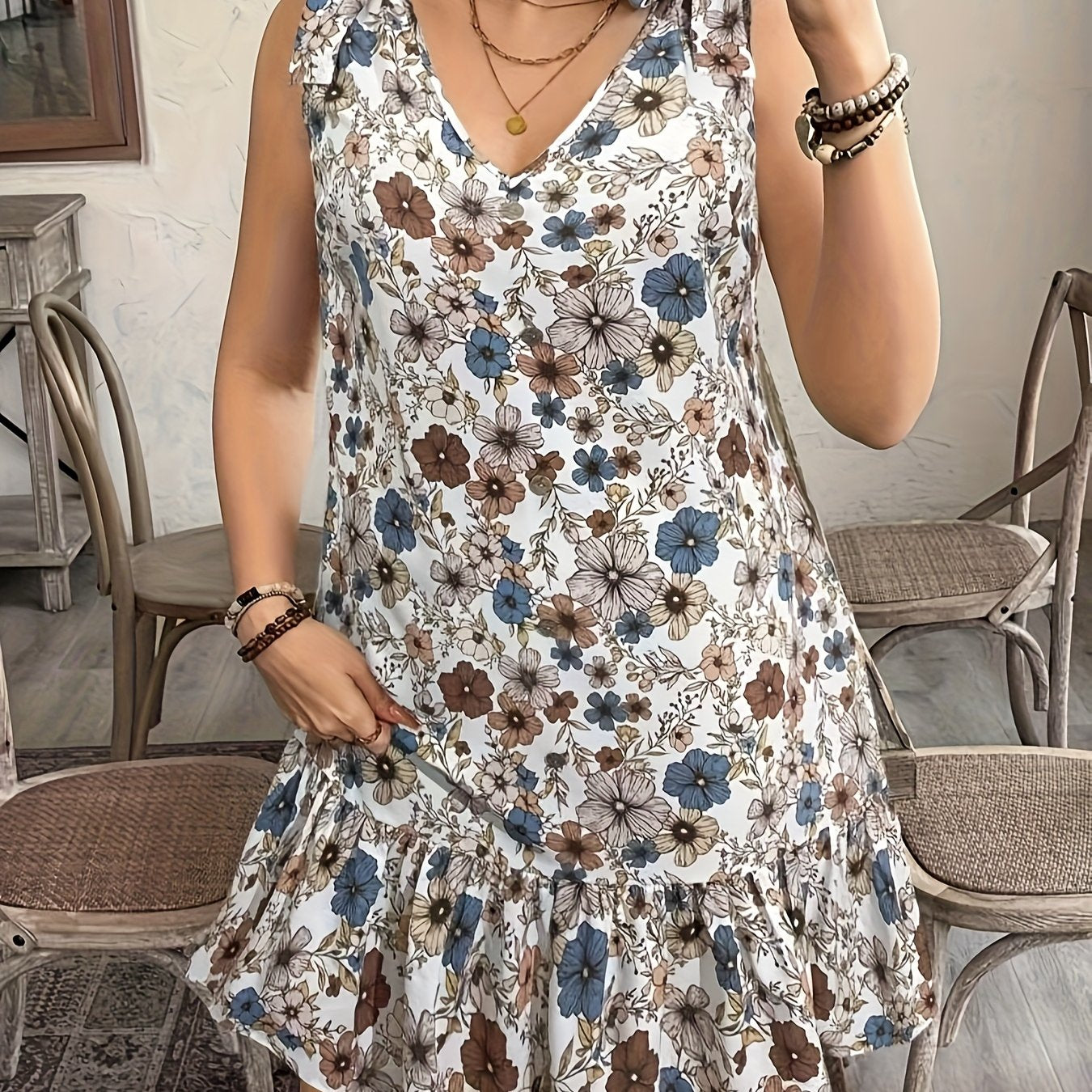 Floral V-Neck Sleeveless Light Weight Dress with Ruffled Hem & Button Details