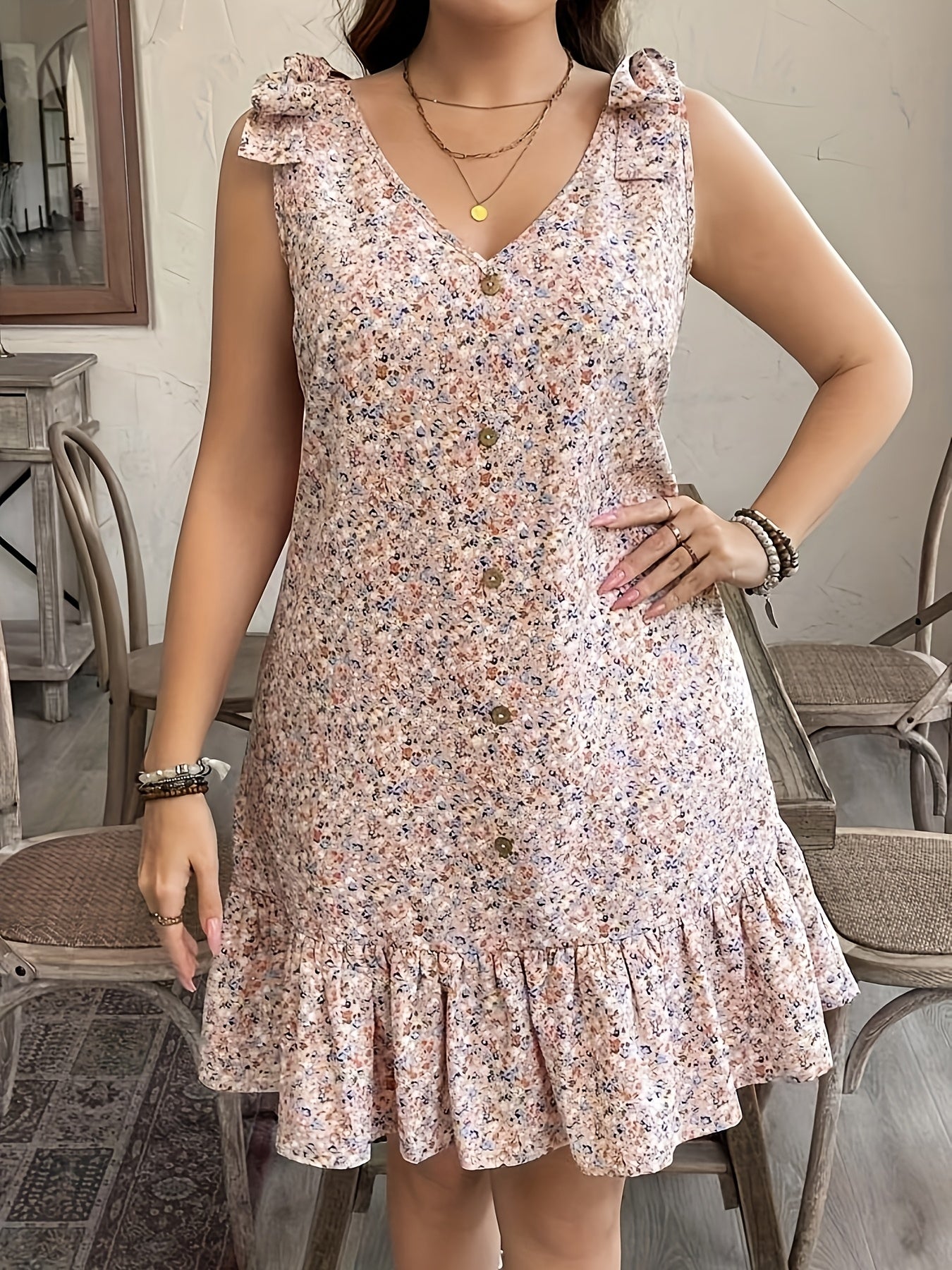 Floral V-Neck Sleeveless Light Weight Dress with Ruffled Hem & Button Details