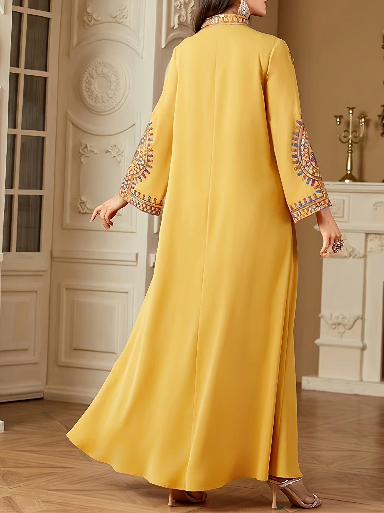 Elegant Middle Eastern-Style Long Dress with Intricate Designs