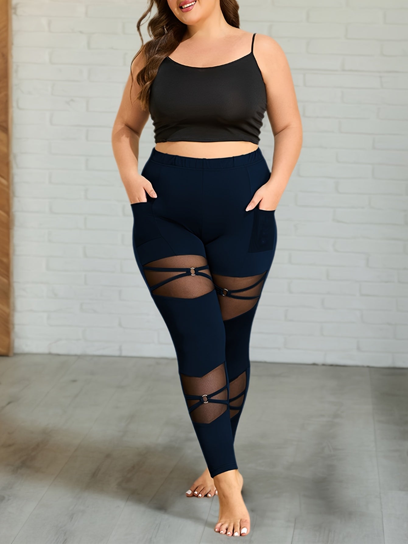 Elegant Plus-Size Knitted Leggings with a Mesh Pocket And Ring Buckle Design.