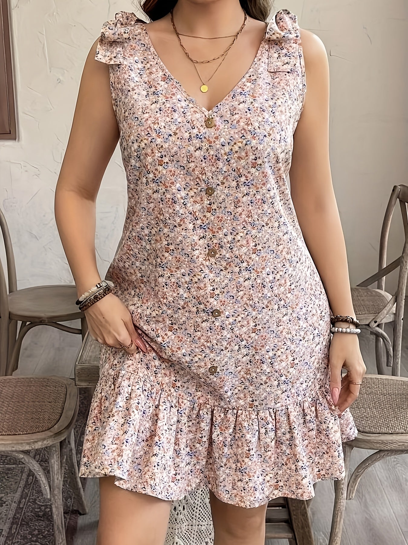 Floral V-Neck Sleeveless Light Weight Dress with Ruffled Hem & Button Details