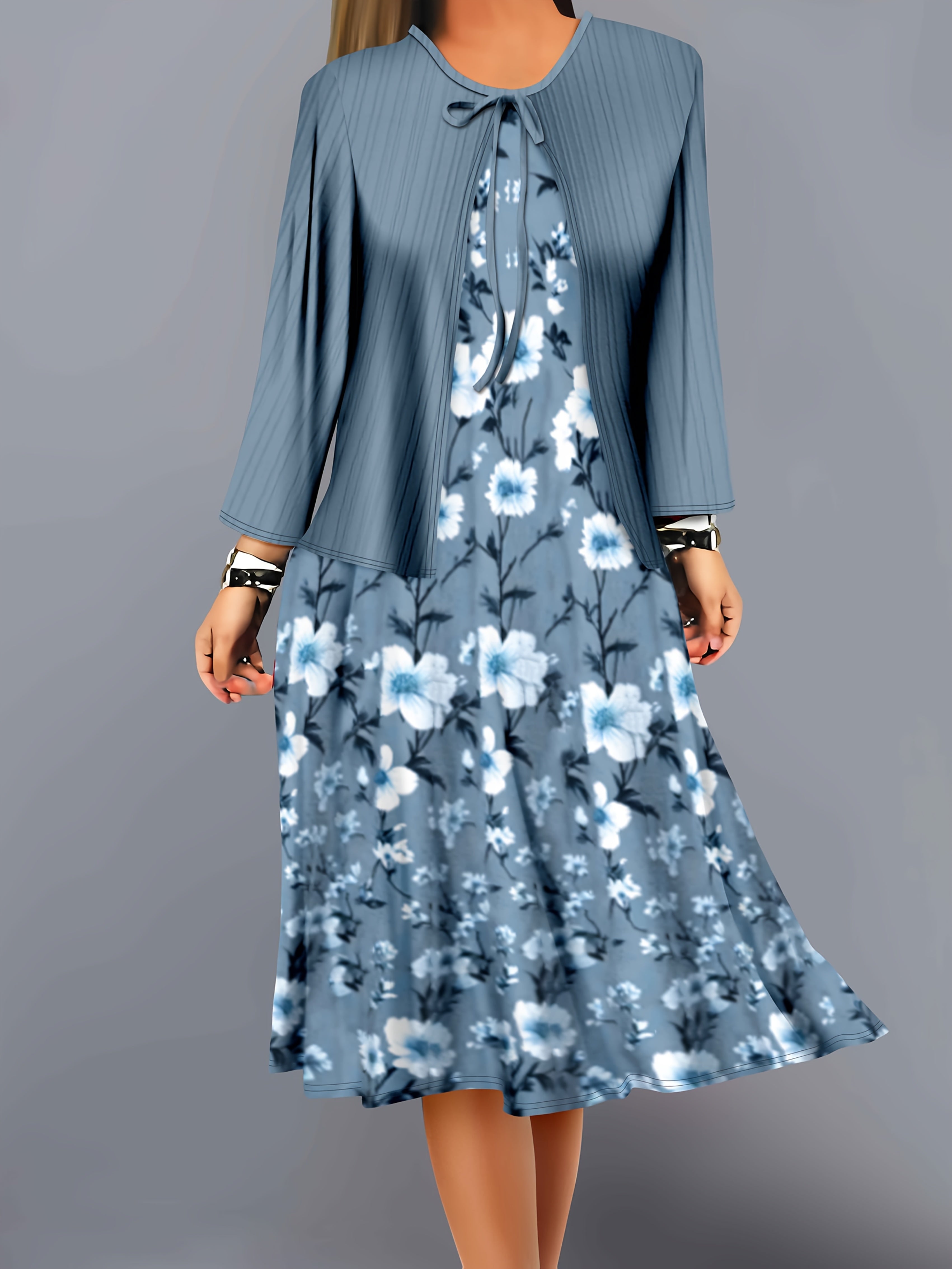 A two-piece set of solid-color striped small cardigan and floral printed dress for fashionable women