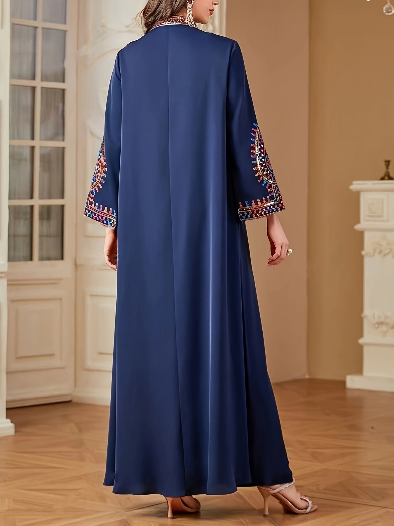 Elegant Middle Eastern-Style Long Dress with Intricate Designs
