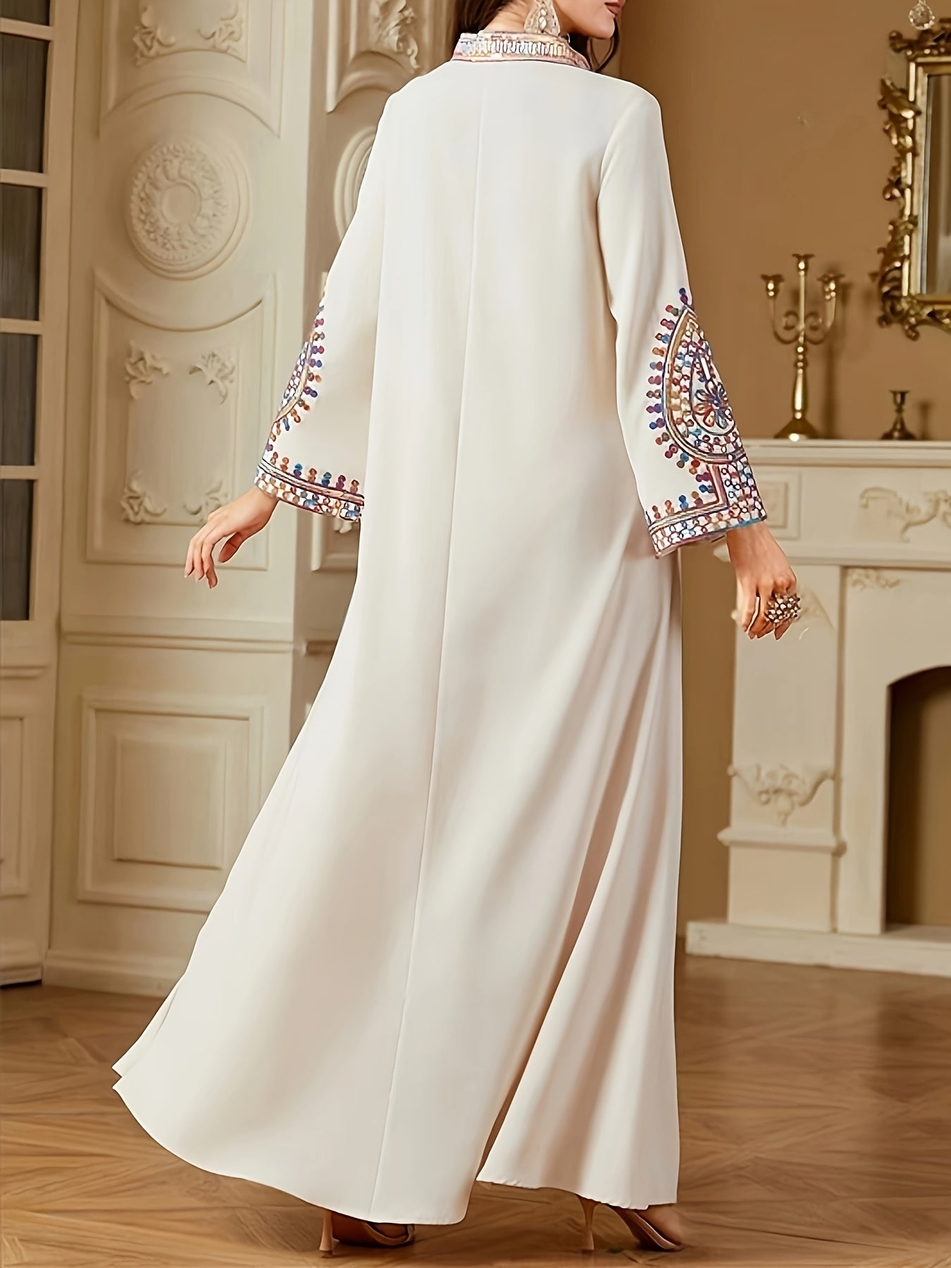 Elegant Middle Eastern-Style Long Dress with Intricate Designs