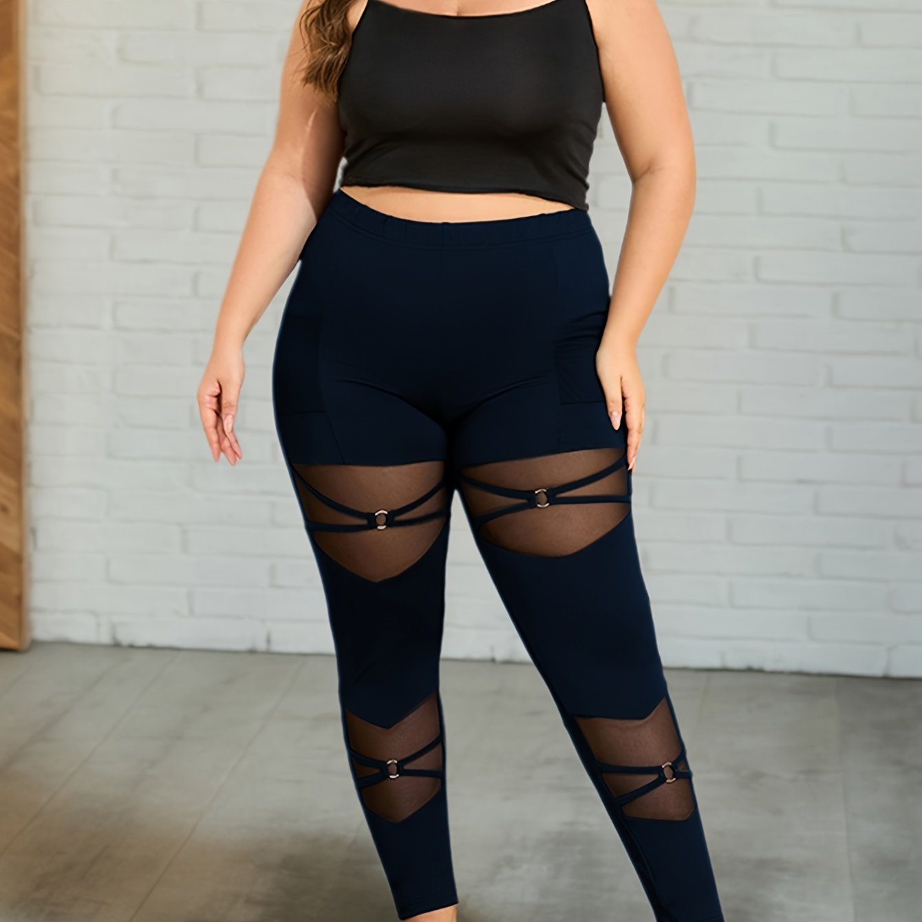 Elegant Plus-Size Knitted Leggings with a Mesh Pocket And Ring Buckle Design.